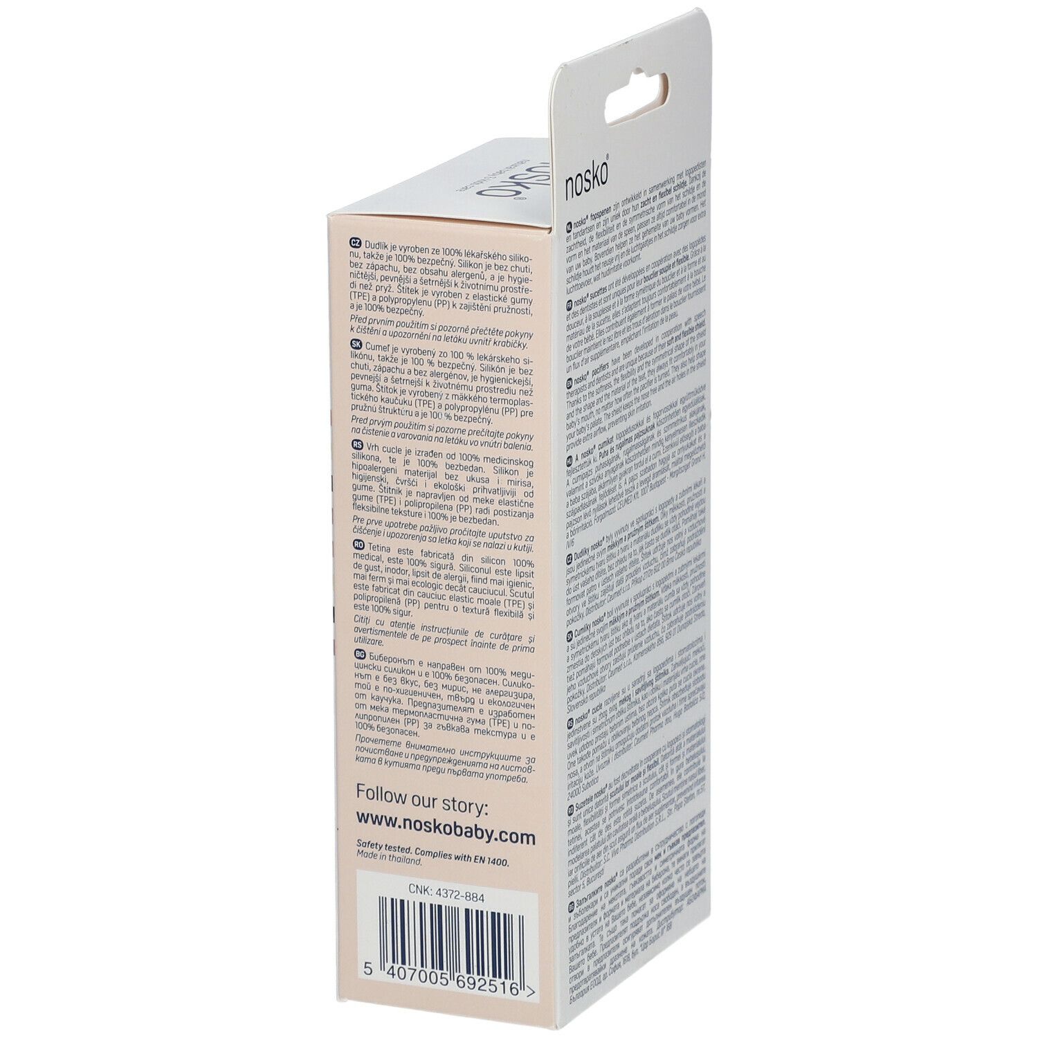 Zijkant van de nosko® fopspenen verpakking. Tekst en barcode. Fabrikant informatie.