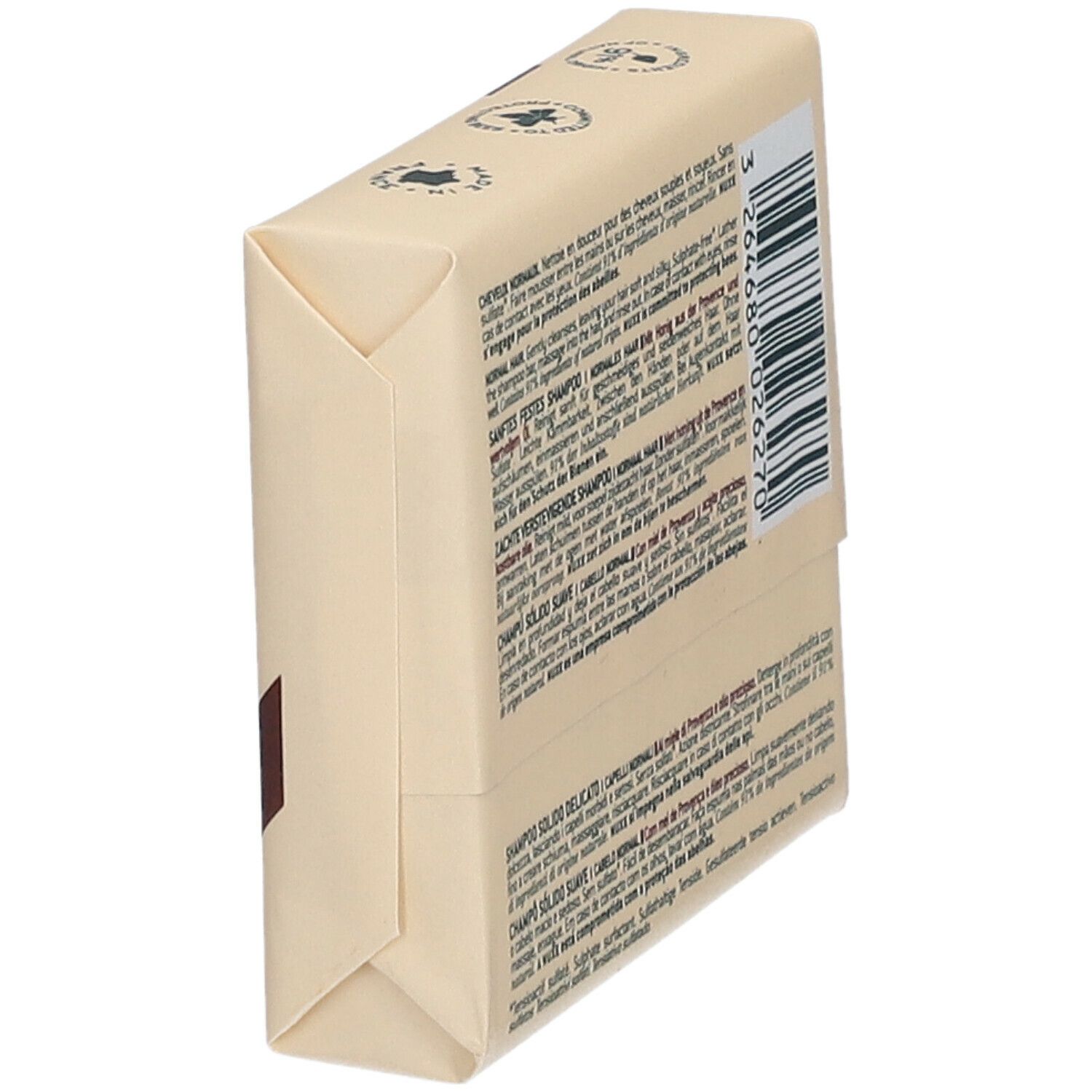 Achterkant van de shampooverpakking. Meertalige tekst. Informatie over ingrediënten en gebruik.