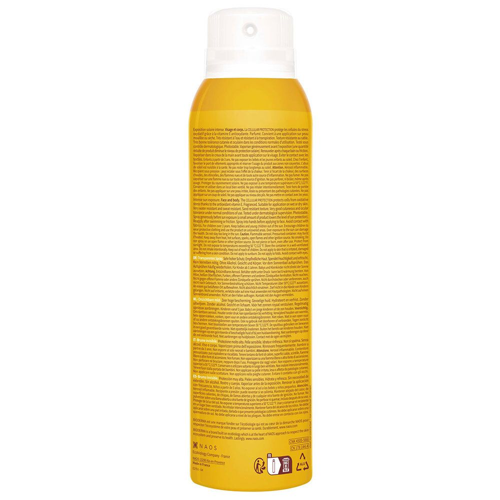 Achterkant van een gele sprayfles. Tekst in meerdere talen. Informatie over het product en het gebruik.
