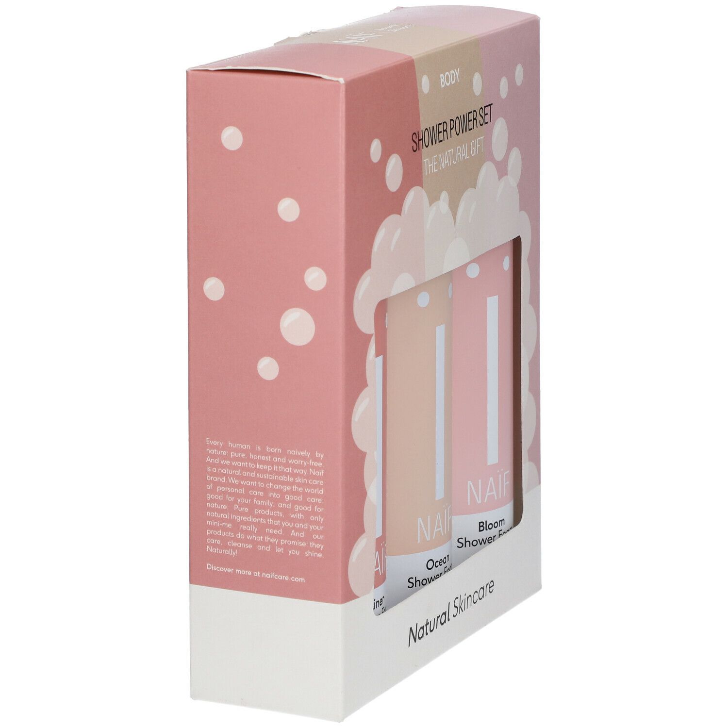 Rosa Geschenkbox mit drei zylindrischen Produkten. Die Box zeigt Text und das NAÏF-Logo. Die Produkte sind durch ein Fenster sichtbar.
