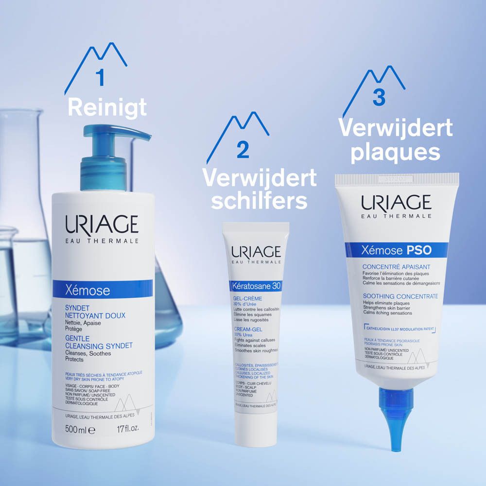 Witte tube URIAGE Xémose PSO. Tekst: Kalmerend concentraat. Blauwe punt. Blauwe en witte tekst.