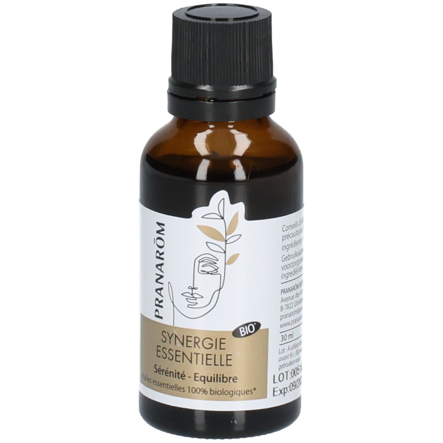 Braune Glasflasche mit schwarzem Deckel, Etikett mit Gesichtsgrafik und "Synergie Essentielle" Aufschrift.