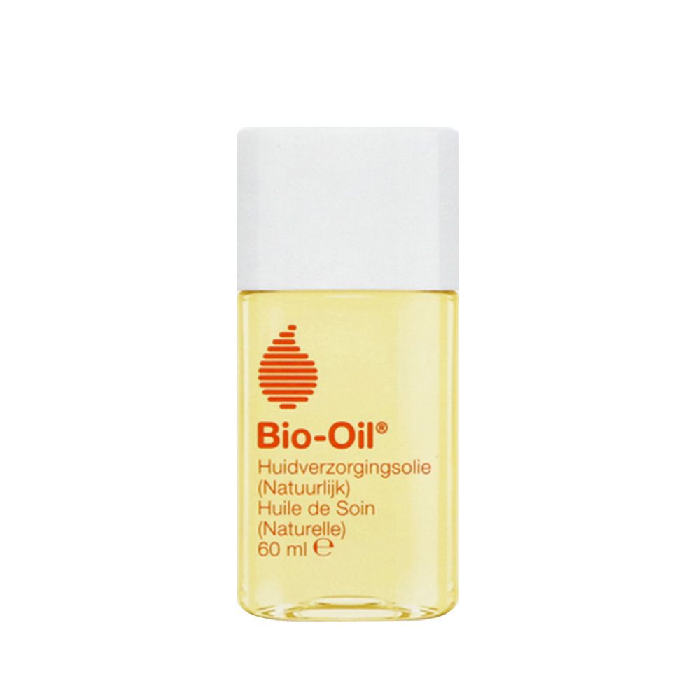 Heldere olie in een cilindrische fles met witte dop. Oranje logo en tekst op het etiket.