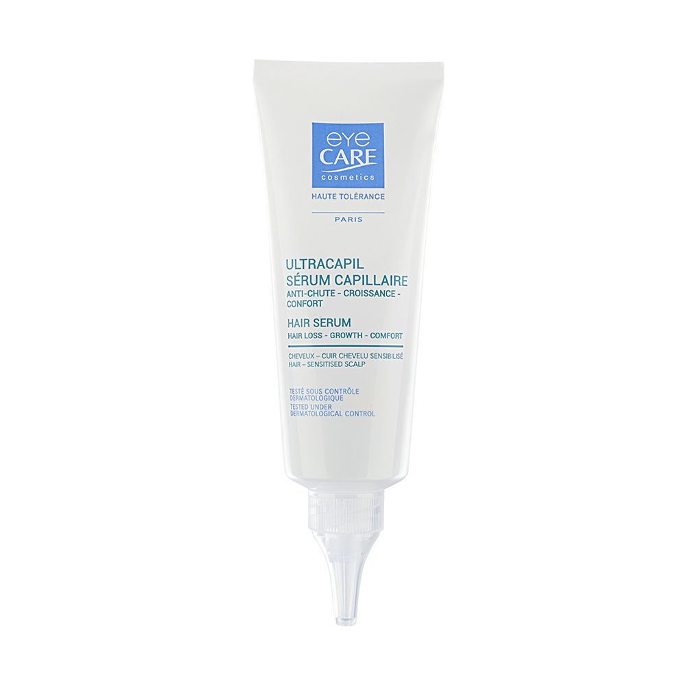 Weißes Serum mit Applikator. Aufschrift: Eye Care, Ultracapil Sérum Capillaire, Hair Serum.