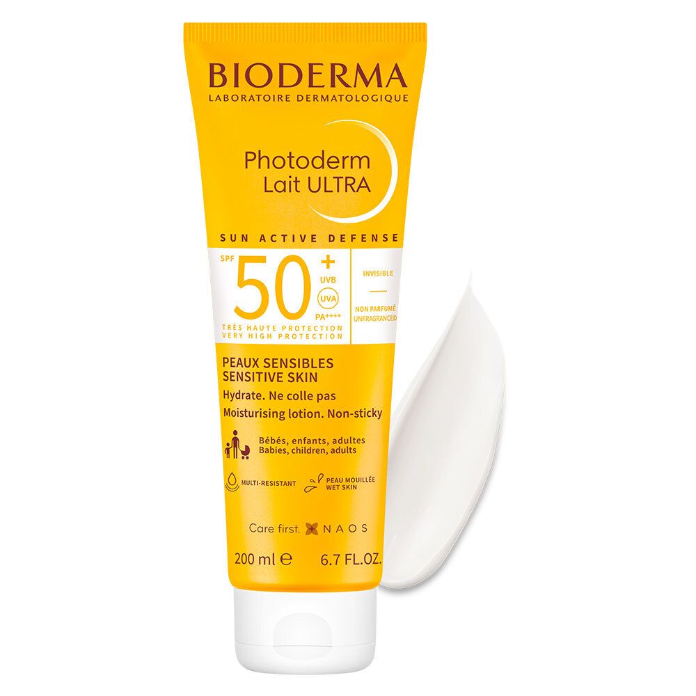Gelbe Tube mit Produktnamen und SPF 50+. Daneben ein Klecks Creme.