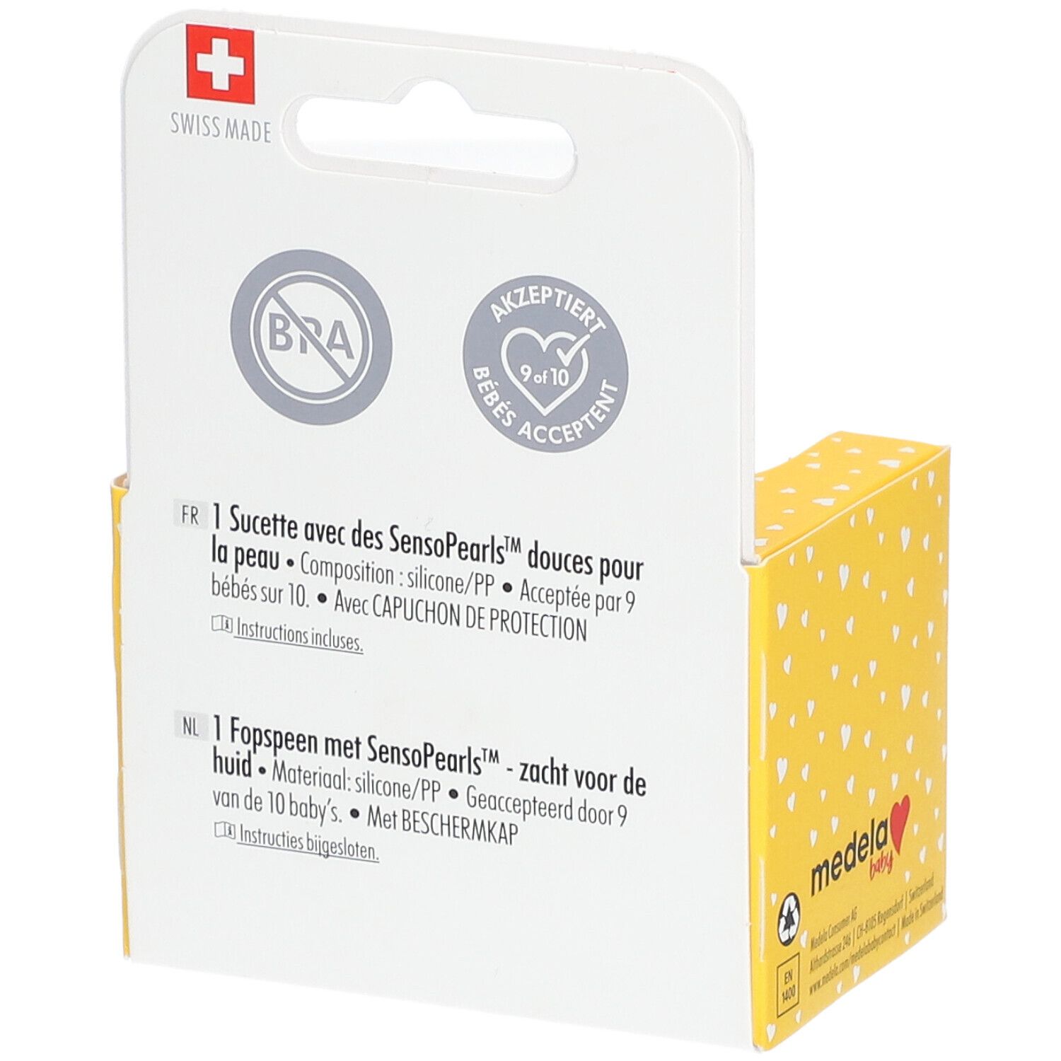 Dos de l'emballage. Texte: ingrédients, acceptation, protection. Boîte jaune à motifs cœurs.