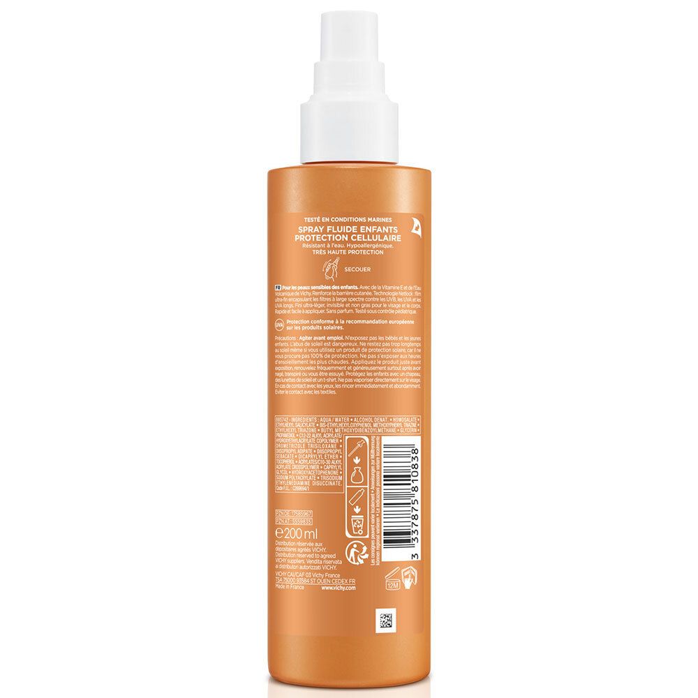 Dos du flacon de spray solaire. Texte multilingue. Contient des informations.