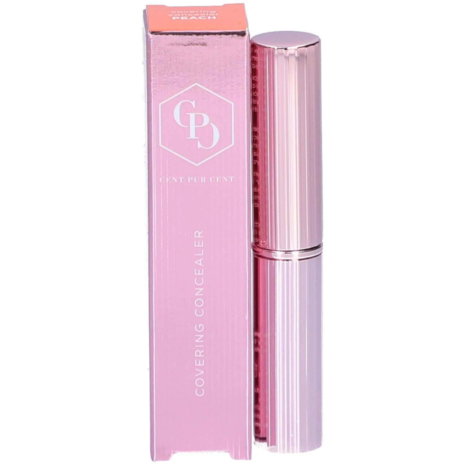 Cilindrische, roze concealer stick. Geribbelde oppervlakte, zilveren ring in het midden. Dop aan de bovenkant.