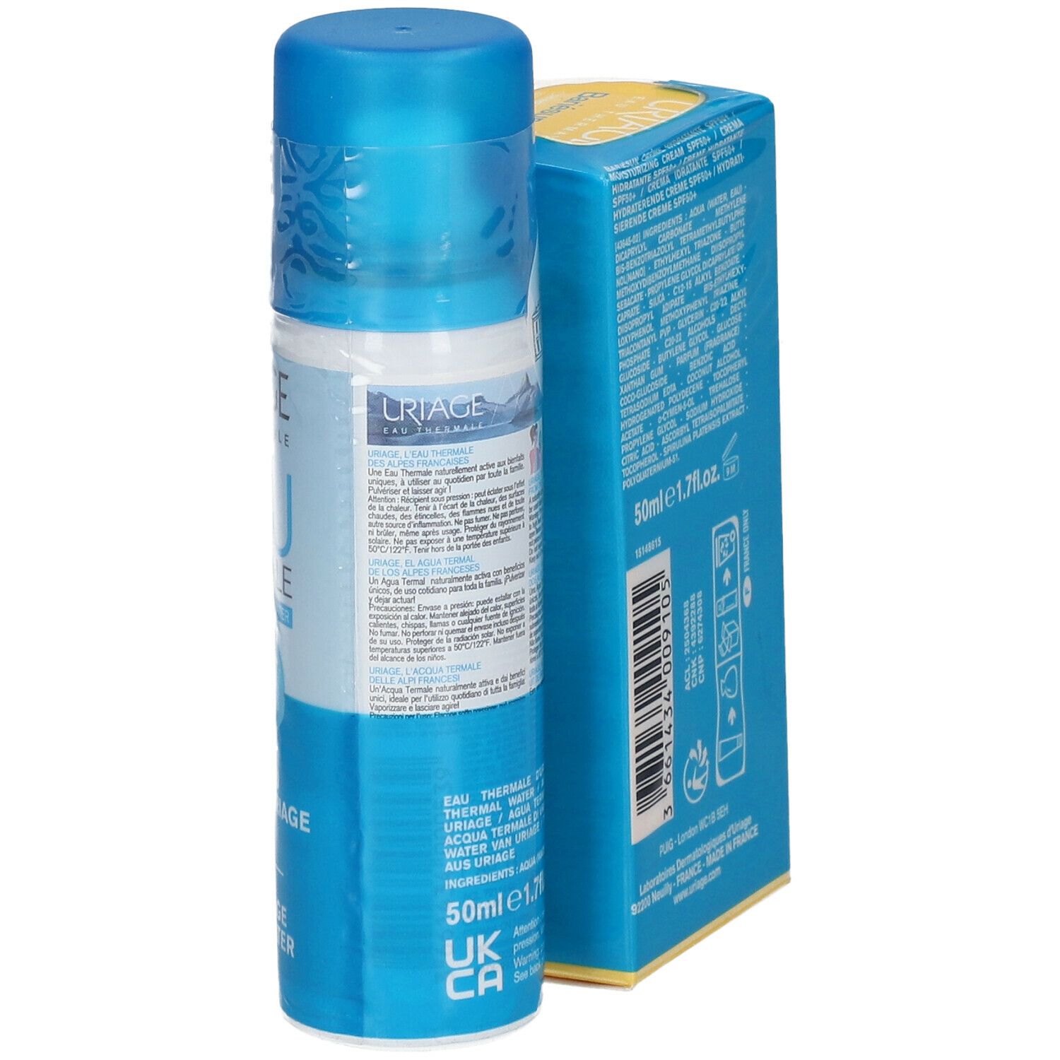 Blaue Sprühflasche und gelbe Schachtel. Auf der Flasche steht "URIAGE EAU THERMALE". Auf der Schachtel steht "50+".