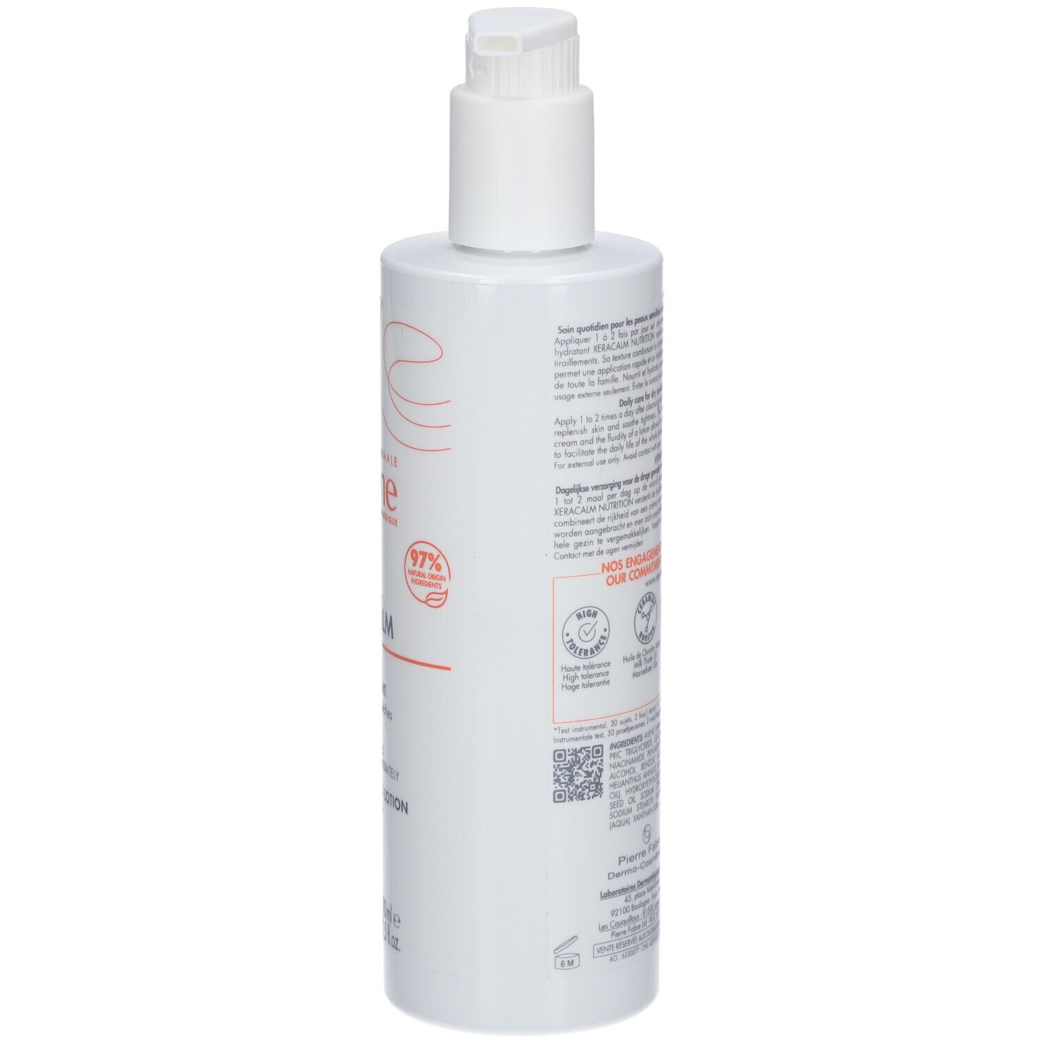 Achterkant van de witte fles met tekst en logo's. Bevat informatie over ingrediënten en recycling.