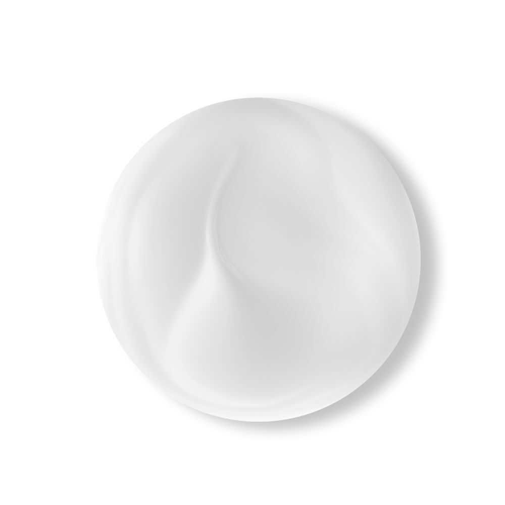 Close-up van een witte crème. Ronde vorm, gladde textuur. Schaduweffect.