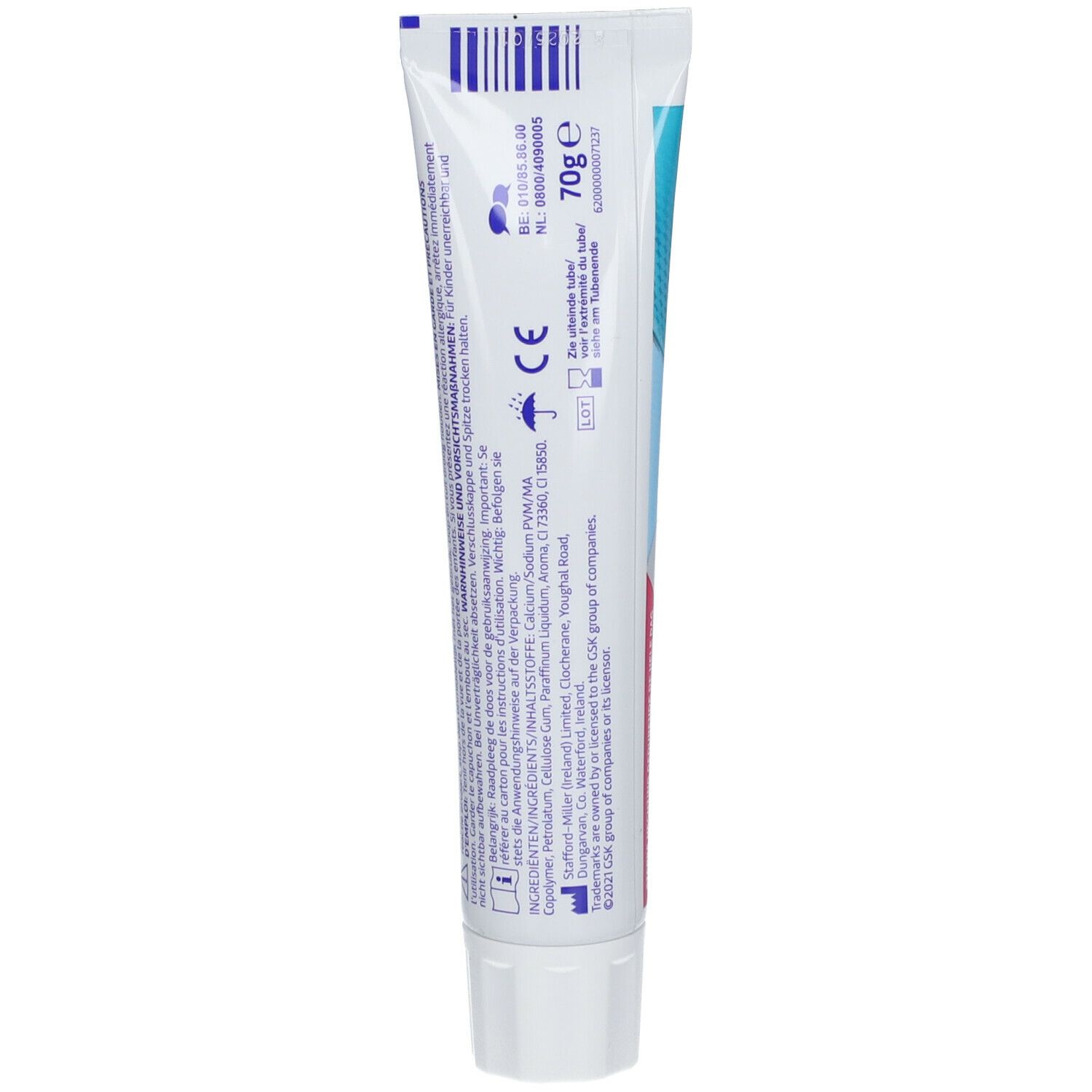 Achterkant van de Corega Ultra crème tube. Bevat informatie over ingrediënten en fabrikant.