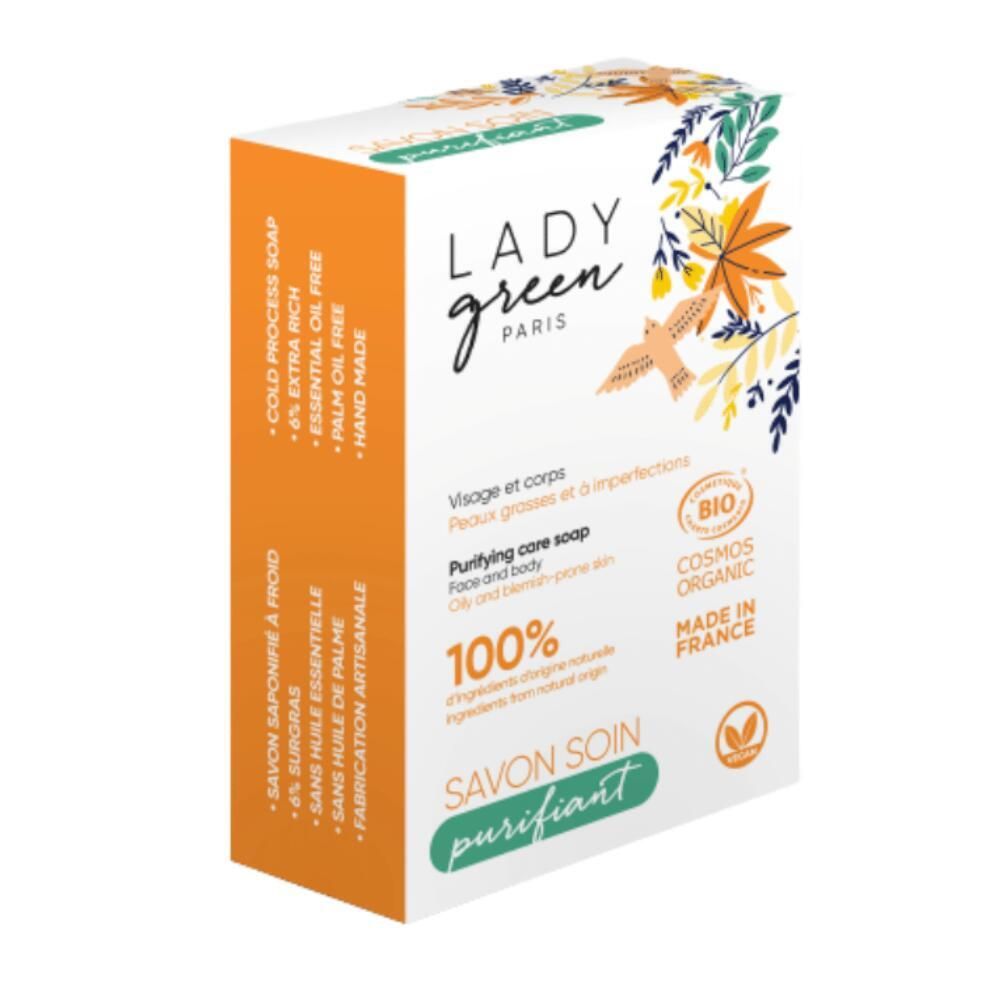 Doosje Lady Green Feste Seife. Savon Soin Purifiant. Bio-certificering. Oranje-wit design met bladeren en vogel. Natuurlijke ingrediënten.
