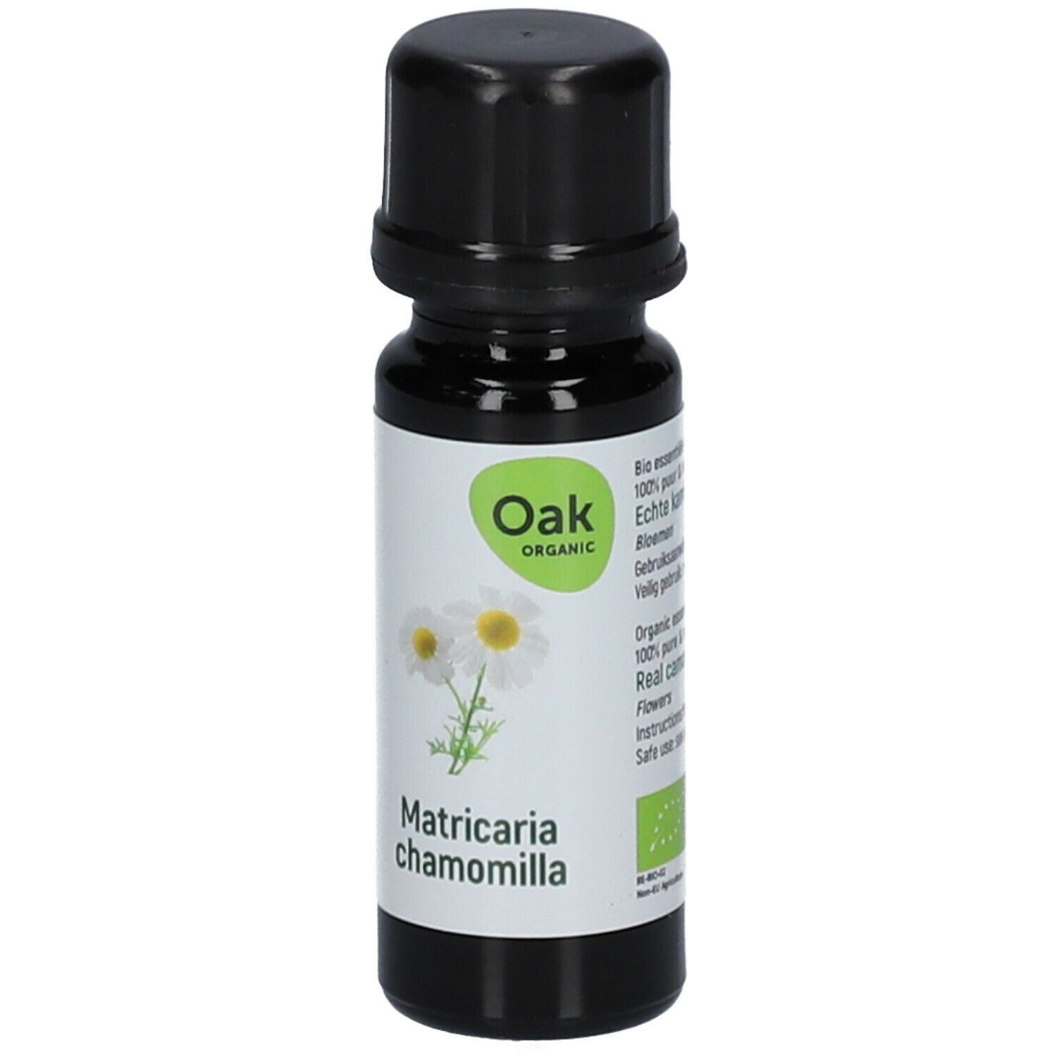 Bruine glazen fles met zwarte dop. Etiket met kamillebloemen en tekst 'Matricaria chamomilla'. 'Oak Organic' logo.