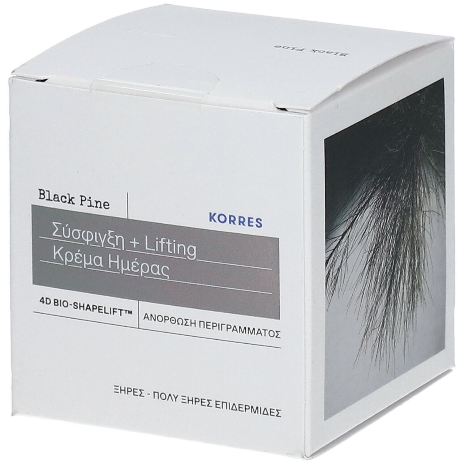 Boîte blanche avec informations produit en grec et image de branches de conifères. Inscription: Black Pine, KORRES.