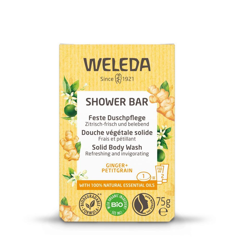 Gele verpakking met productinfo. "WELEDA"-logo, "SHOWER BAR", "Ingwer + Petitgrain". Bio-keurmerk en 75g-aanduiding.