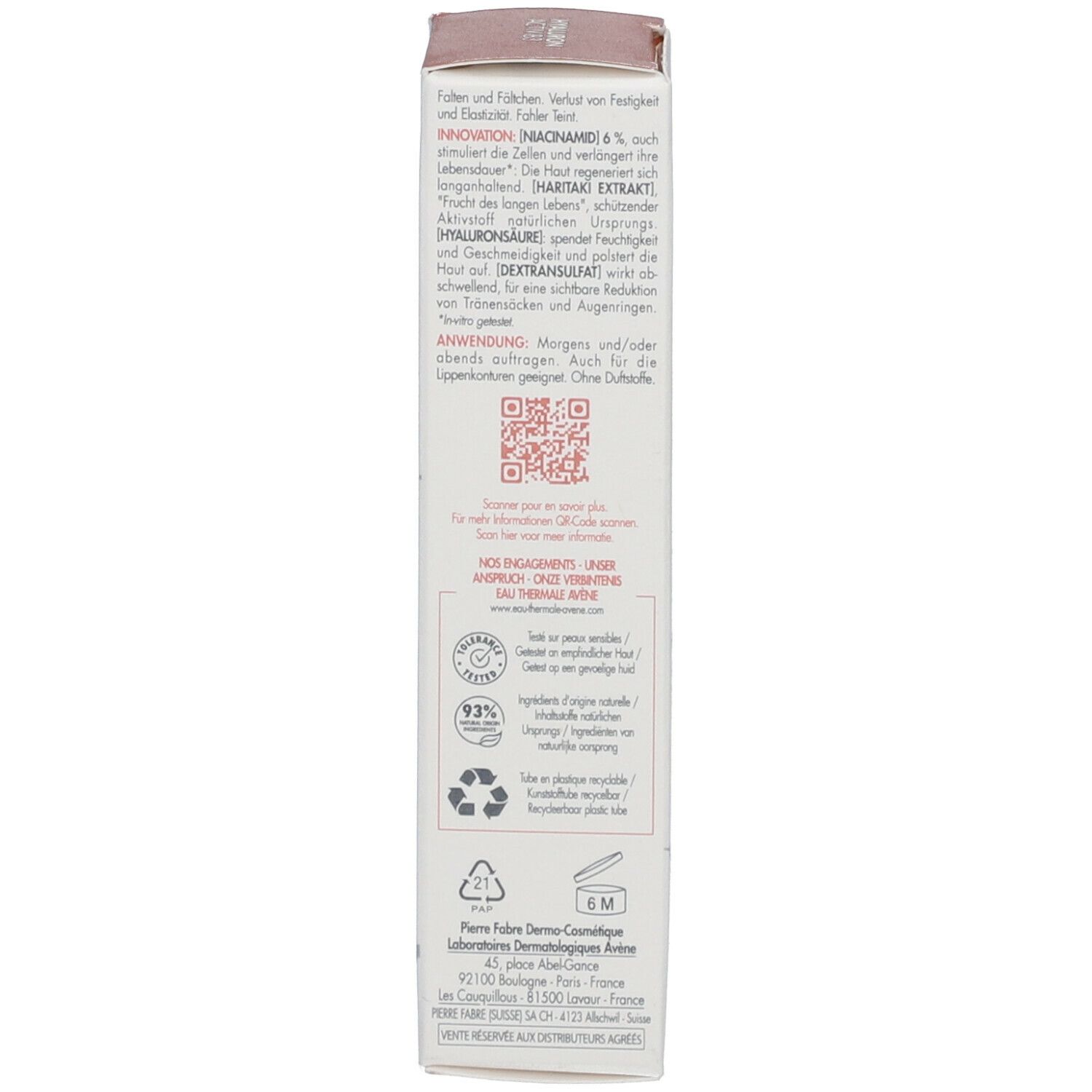 Dos de l'emballage du produit. Texte: ingrédients, code QR, symboles de recyclage, adresse du fabricant.