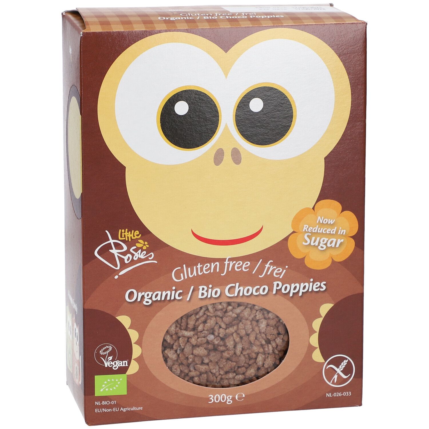 Verpakking van Bio-Getreide Choco Poppies. Transparant venster met product. Opschrift: Glutenvrij, Bio, 300g. Illustratie van een apengezicht.