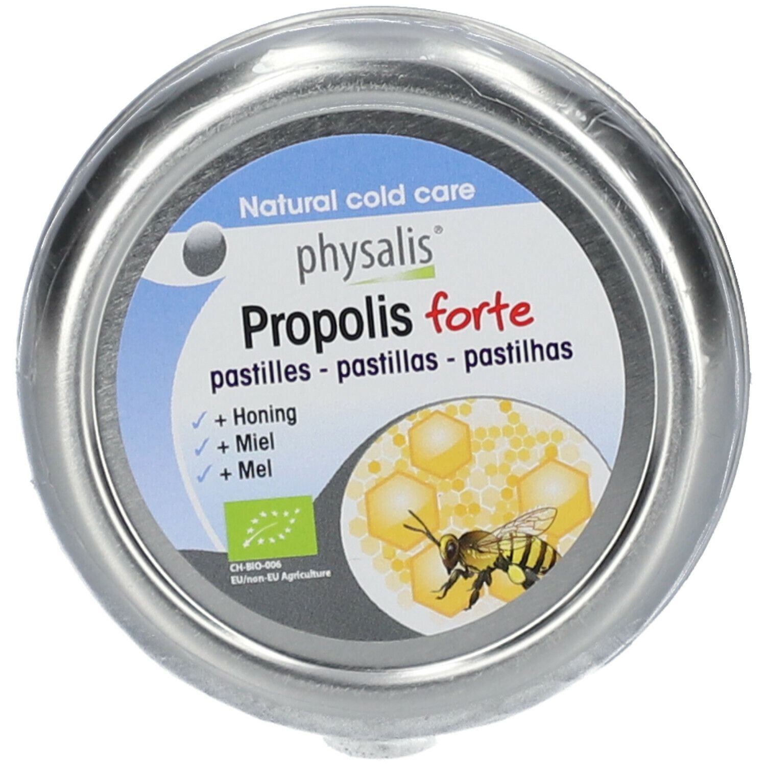Boîte ronde avec inscription "Physalis Propolis forte". Illustration d'abeille et de miel. Label bio.