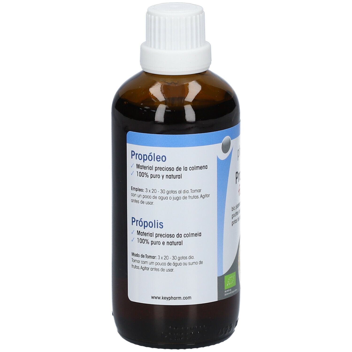 Achterkant van een bruine glazen fles met witte dop. Etiket met productinformatie in meerdere talen. Bio-label.