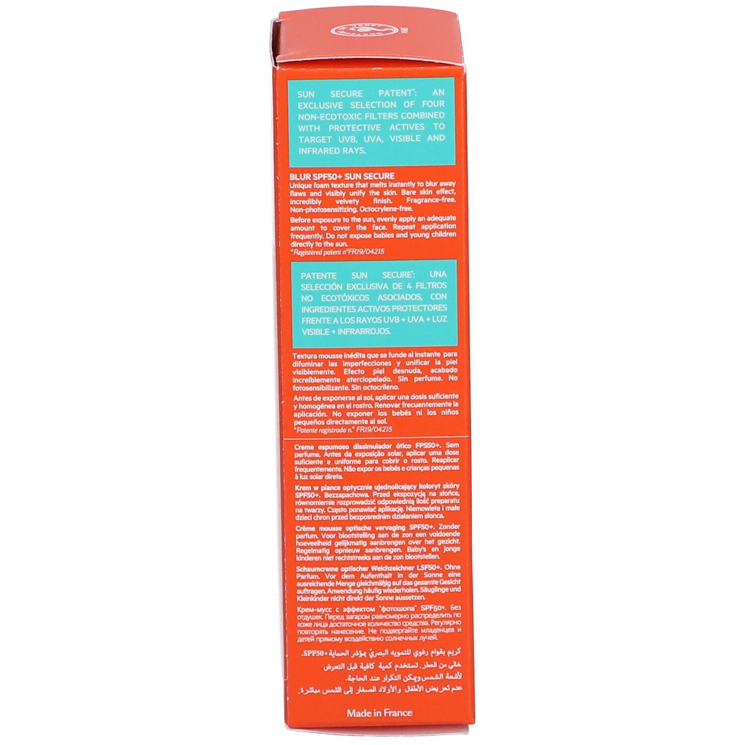 Dos de la boîte orange. Texte: Blur Sun Secure, SPF 50+, ingrédients, mode d'emploi. Fabriqué en France.