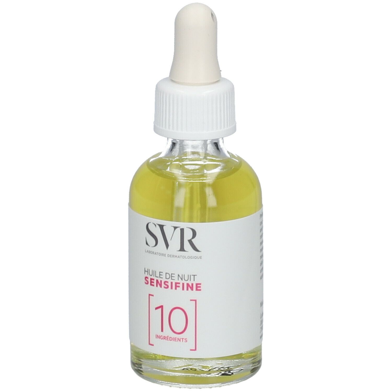 Glazen fles met pipet, gevuld met gele olie. Label: SVR, Huile de Nuit Sensifine, 10 Ingredients.