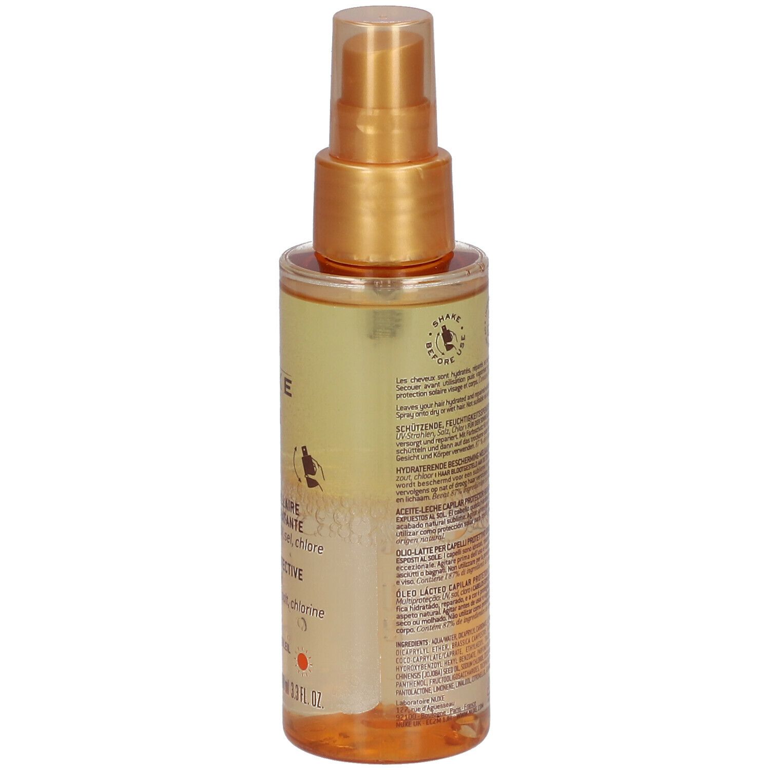 Haaroliefles met goudkleurige spraykop. Etiket met productnaam en -informatie. Merk: Nuxe Sun.