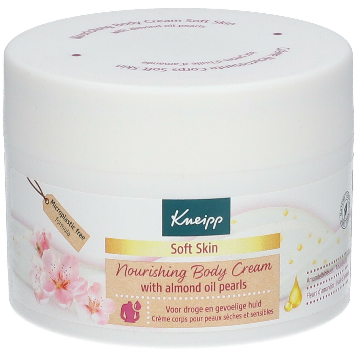 Witte pot met Kneipp-logo en 'Soft Skin'. Etiket met bloemen en 'Nourishing Body Cream'. 