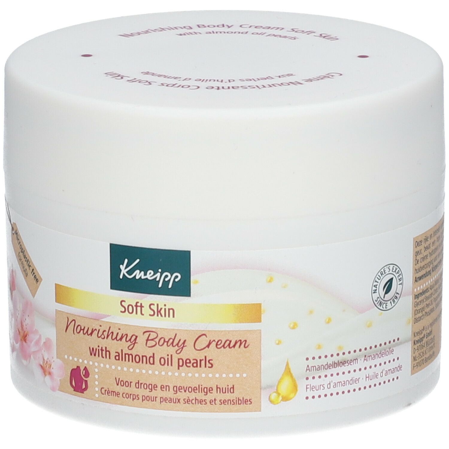 Witte pot met Kneipp-logo en 'Soft Skin'. Etiket met bloemen en 'Nourishing Body Cream'. 