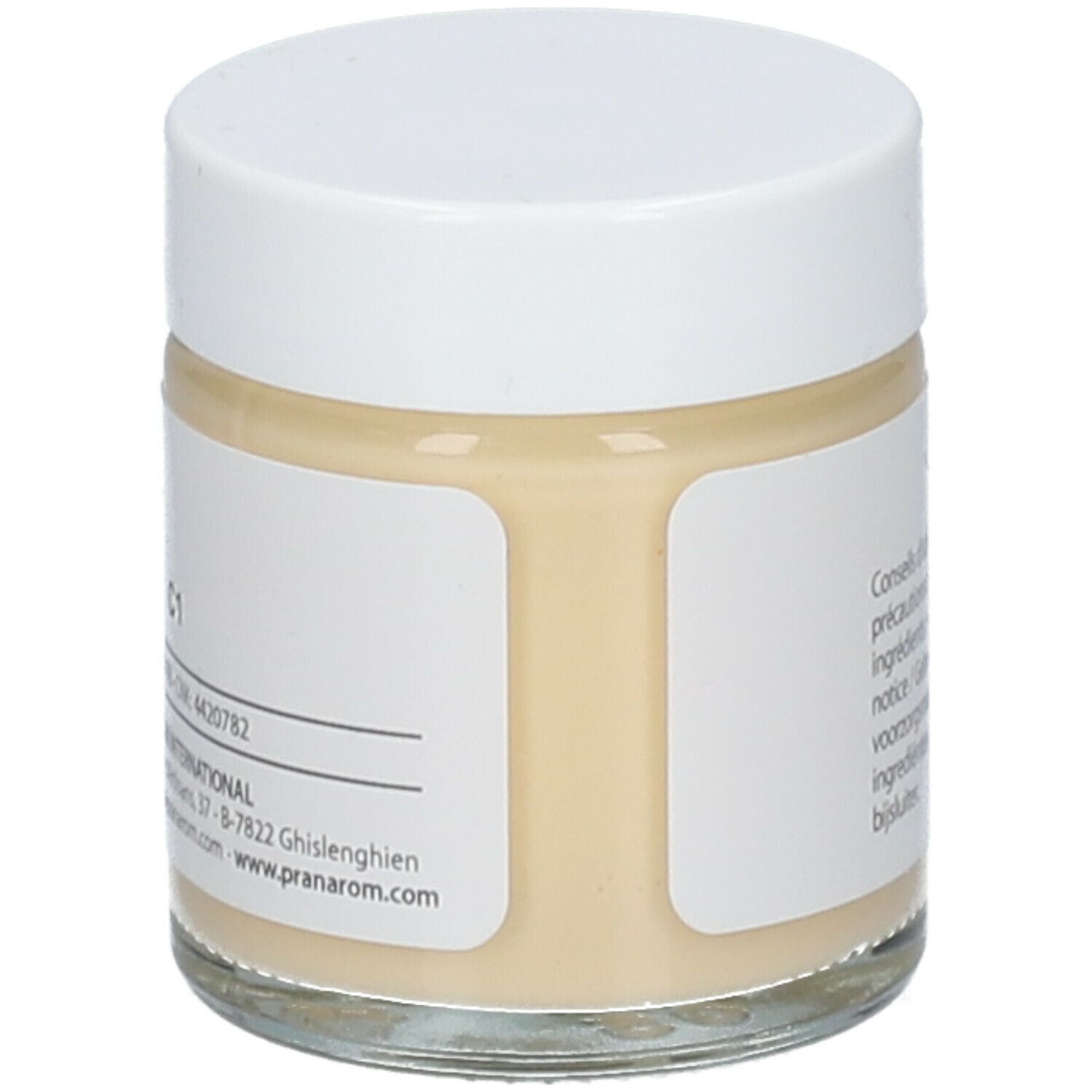 Pot en verre avec couvercle blanc. Étiquette avec informations sur le produit. Substance crème visible.