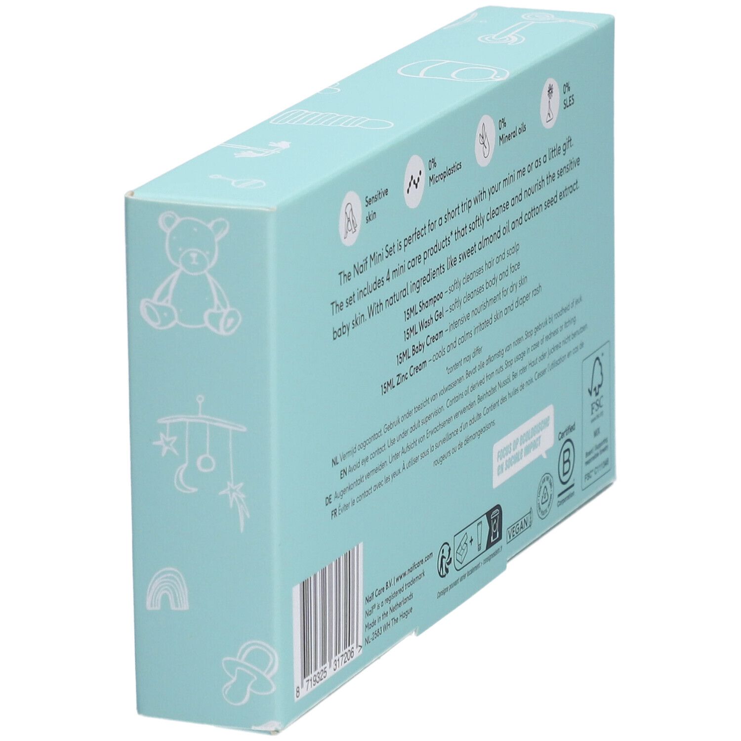 Zijkant van de NAÏF Baby & Kids Mini Set. Tekst met ingrediënten en certificeringen. Lichtblauwe doos.