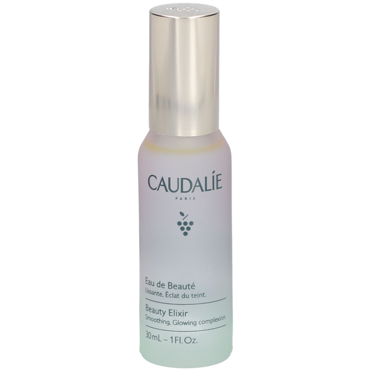 Caudalie Beauty Elixir Flasche. Silberner Sprühkopf, milchig-grünes Glas. Aufschrift: Eau de Beauté, Beauty Elixir, 30ml.