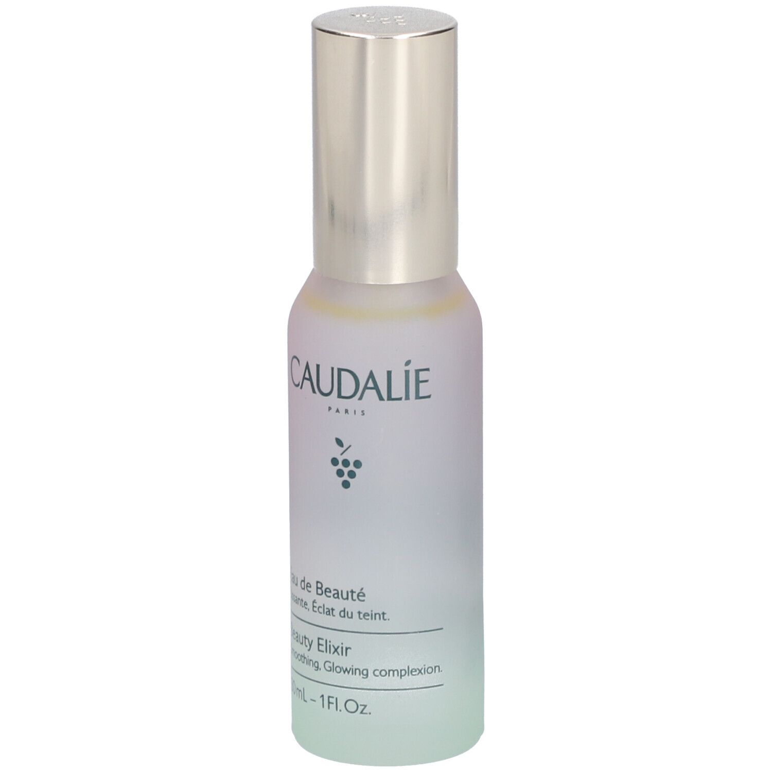 Caudalie Beauty Elixir Flasche. Silberner Sprühkopf, milchig-grünes Glas. Aufschrift: Eau de Beauté, Beauty Elixir, 30ml.