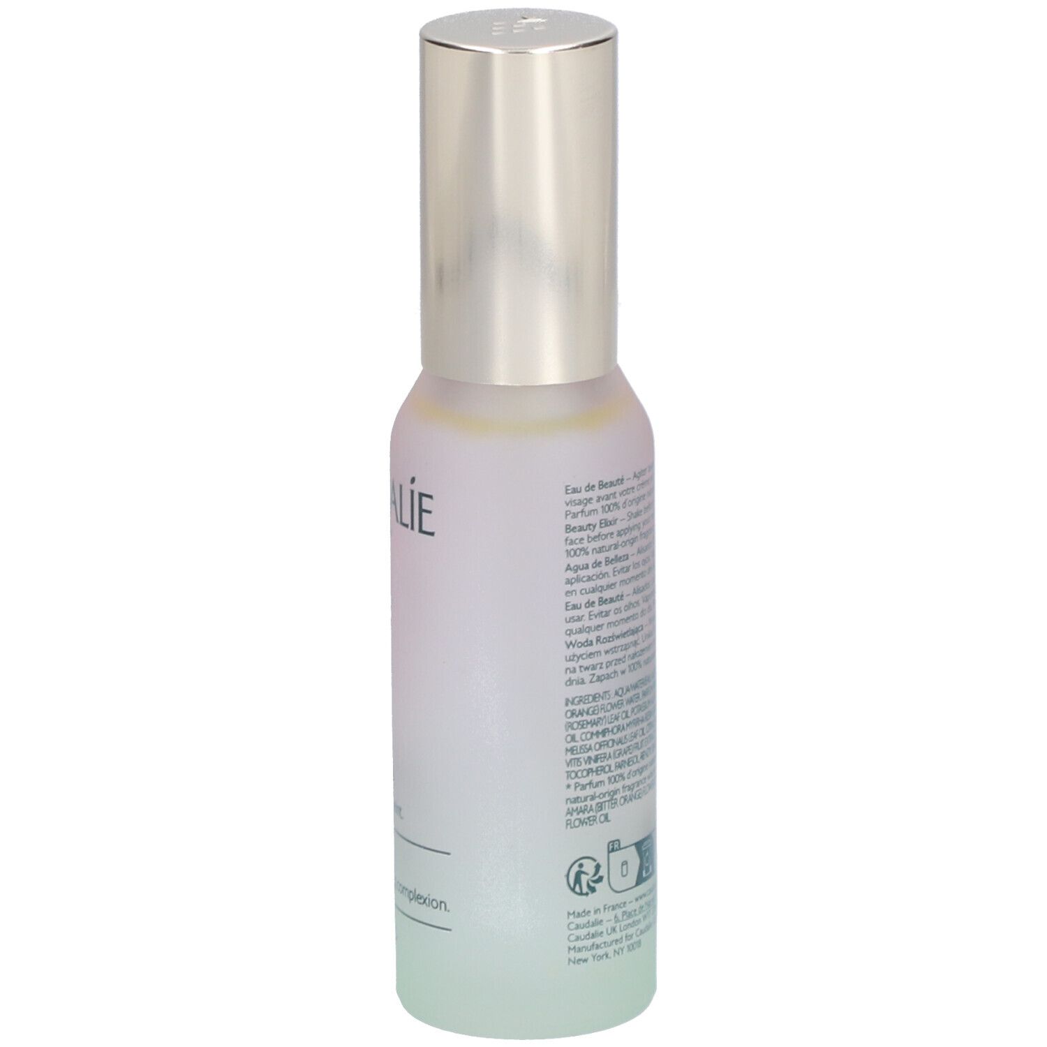 Caudalie Beauty Elixir Flasche. Rückseite mit Text, silberner Sprühkopf. Aufschrift: Eau de Beauté, Beauty Elixir, 30ml.