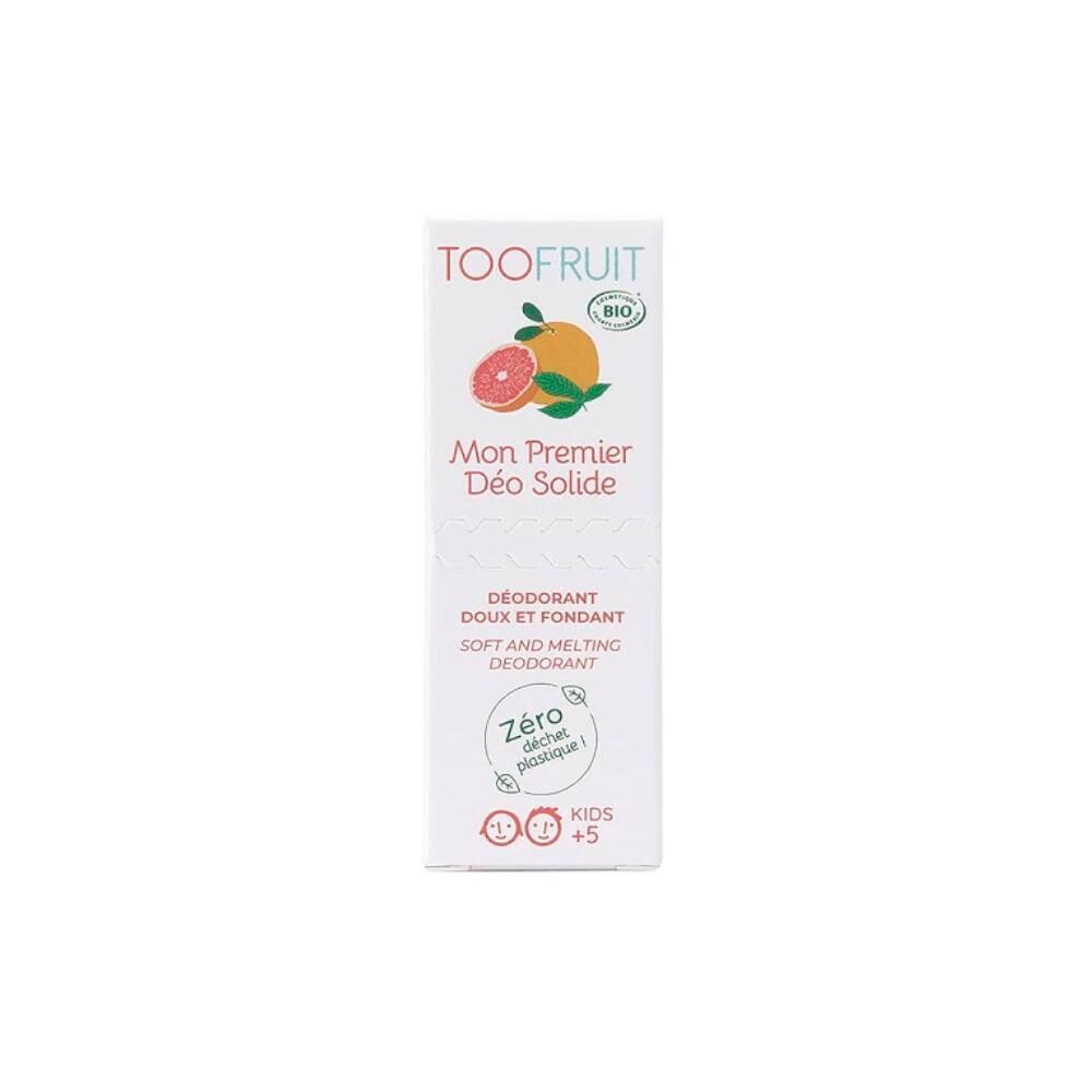 Witte TOOFRUIT-verpakking. Productnaam, afbeelding van grapefruit en bio-logo. Tekst: Mon premier Déo Solide, zéro déchet plastique.