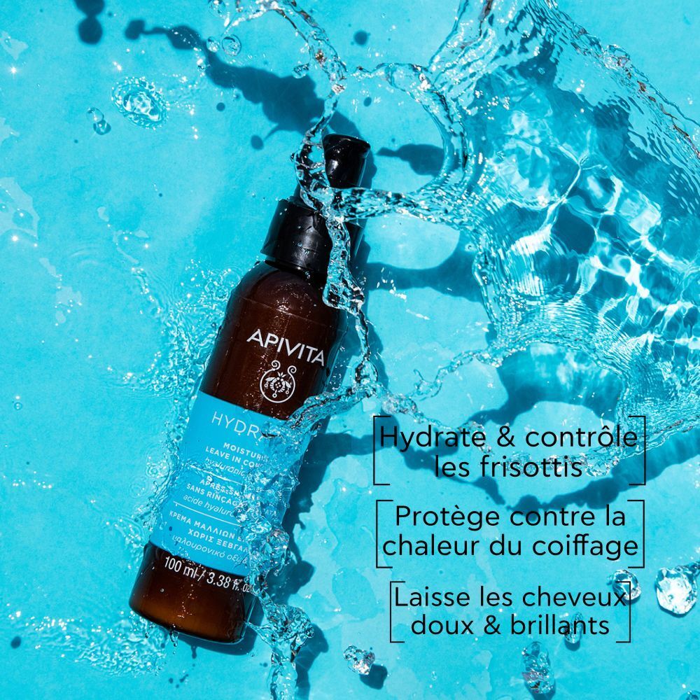 Produit avec jet d'eau. Texte: Hydrate & contrôle les frisottis, protège de la chaleur, rend doux.