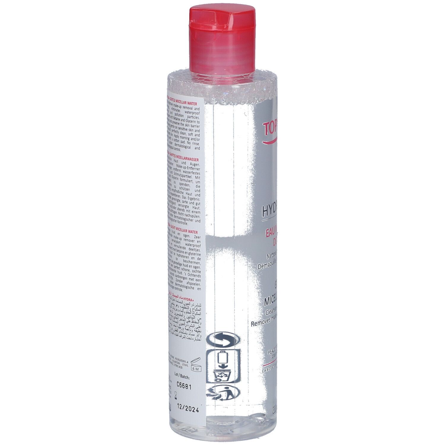 Flacon rond transparent, bouchon rouge. Verso avec texte et symboles. Inscription TOPICREM et numéro de lot.