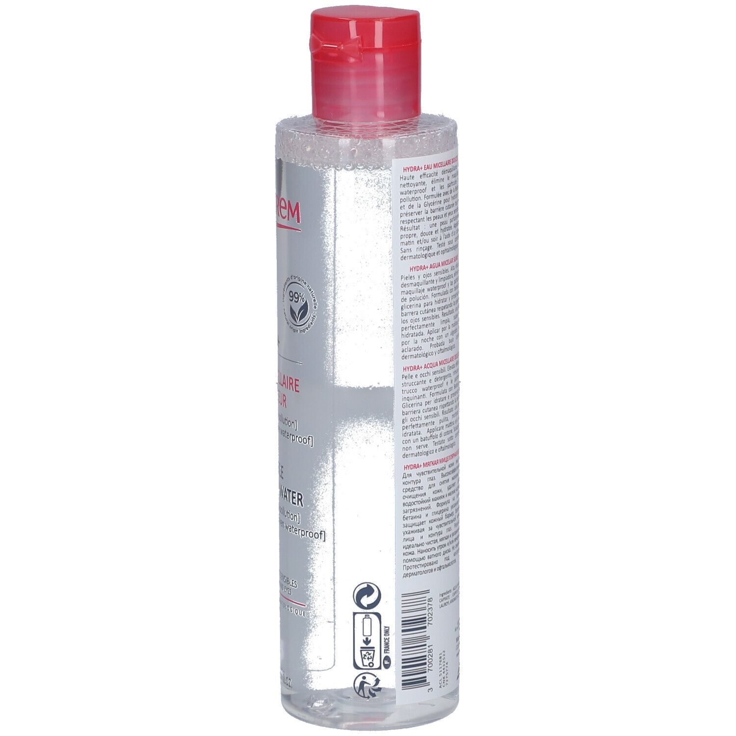 Flacon transparent avec bouchon rouge. Verso avec texte. Inscription TOPICREM et logos. Flacon debout.