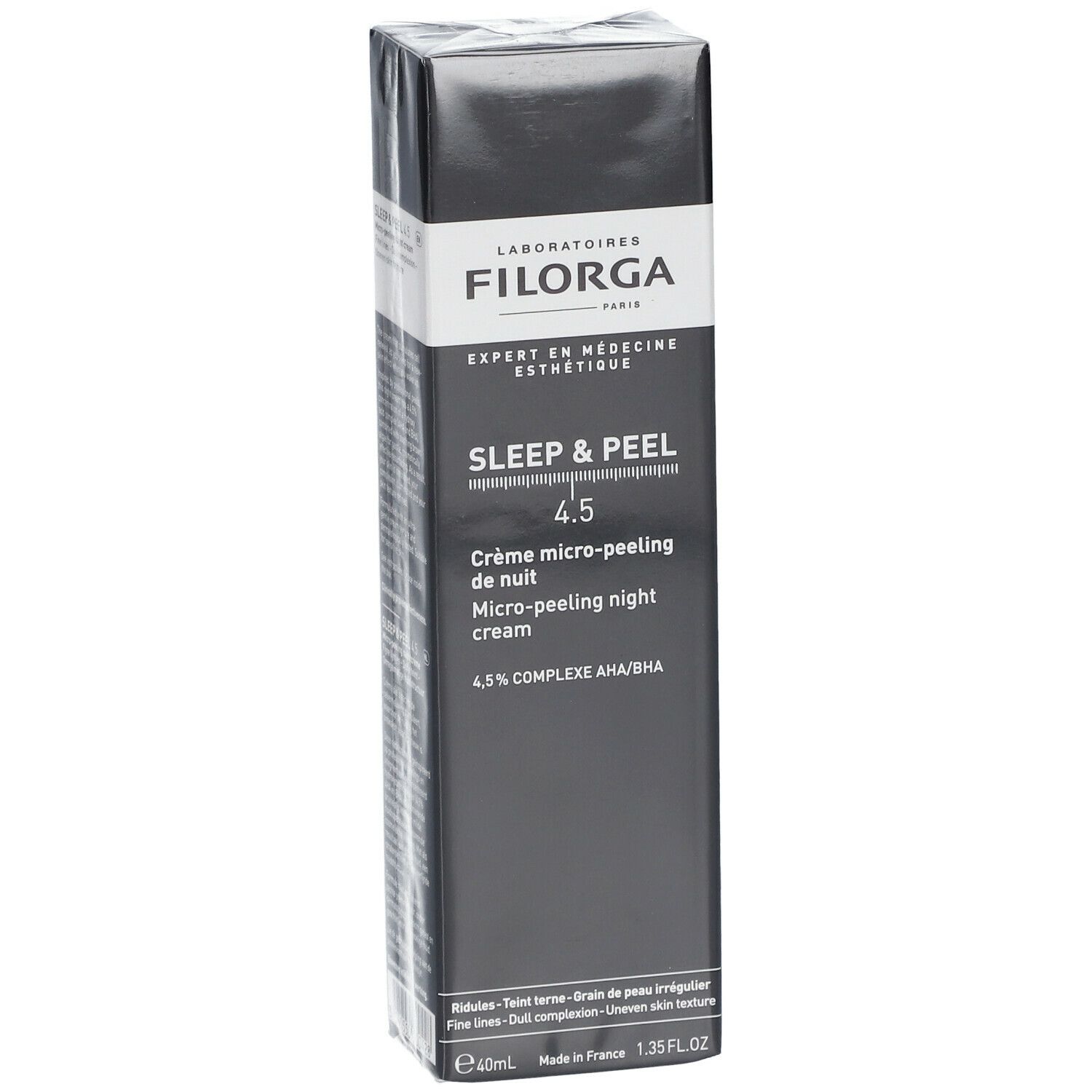 Zwarte verpakking met product- en merknaam. Tekst: Sleep & Peel 4.5, Crème micro-peeling de nuit, Filorga.