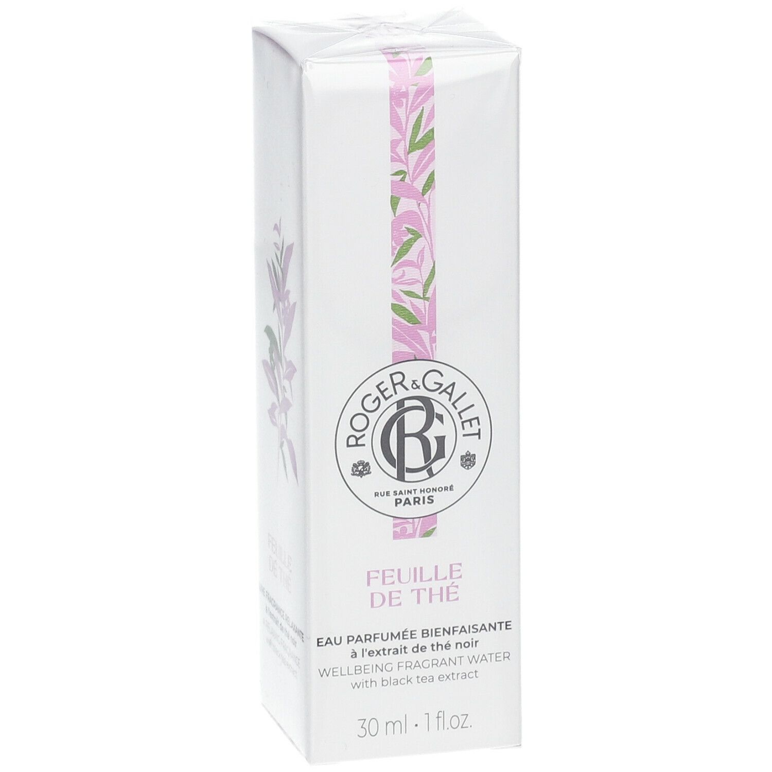 Weiße Schachtel mit Produktnamen und Logo. Rosa und grüne Blätter-Dekoration. Text: FEUILLE DE THÉ, 30 ml.