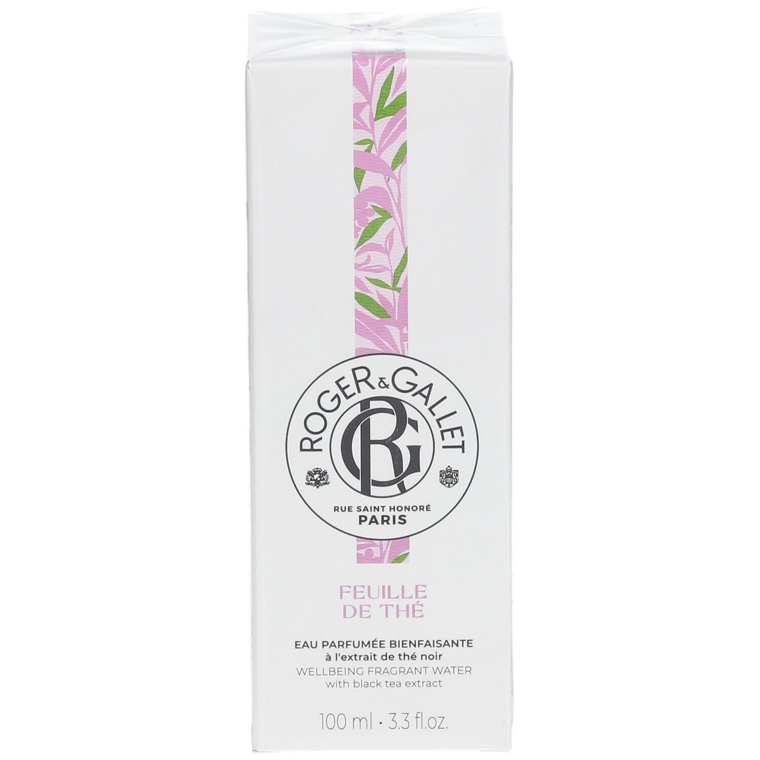Witte verpakking met logo en productnaam. Roze en groene bladerillustratie. Tekst: Eau Parfumée Bienfaisante.