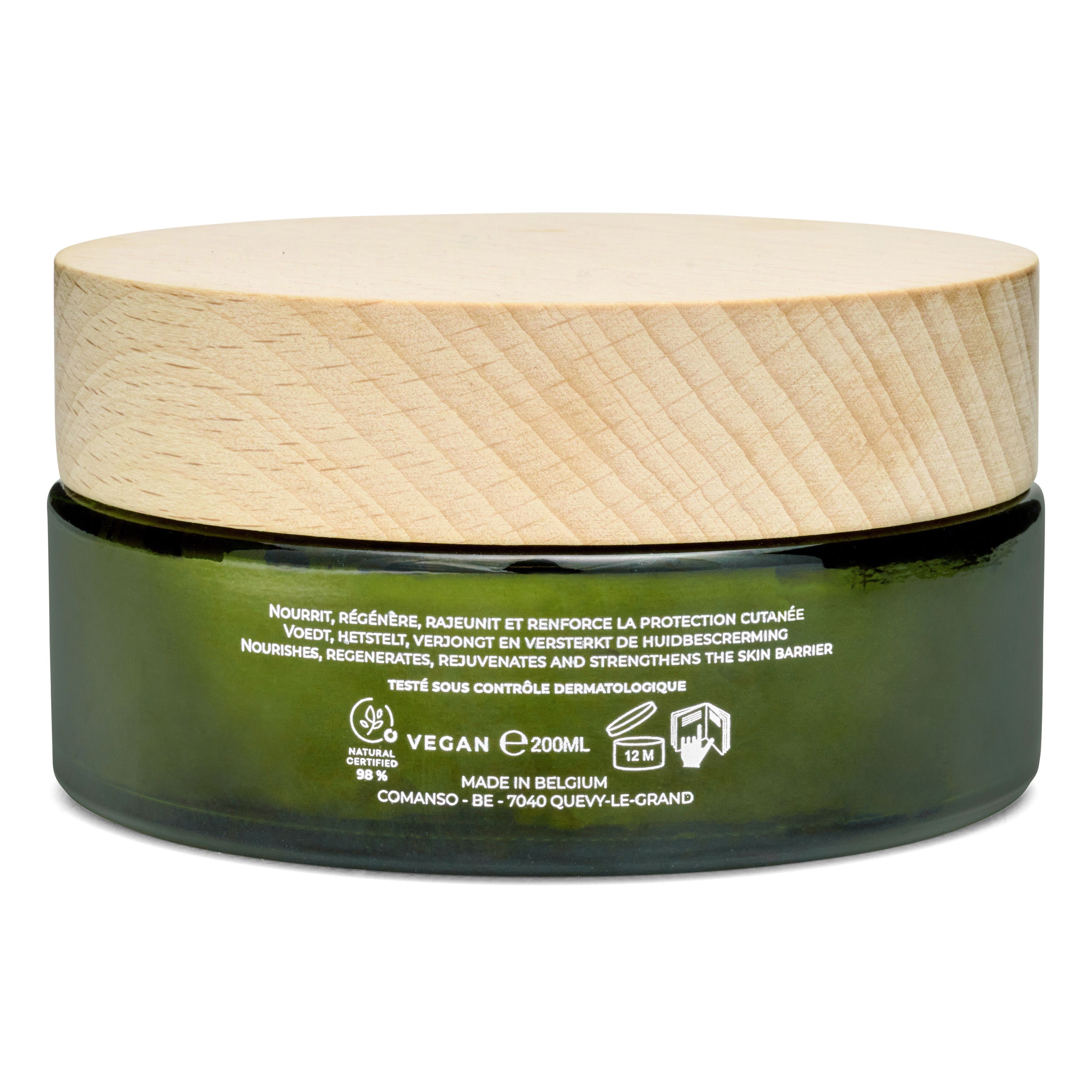 Rückseite des grünen Glasbehälters. Text: Nourrit, régénère, rajeunit et renforce la protection cutanée. Vegan, 200ml, Made in Belgium.