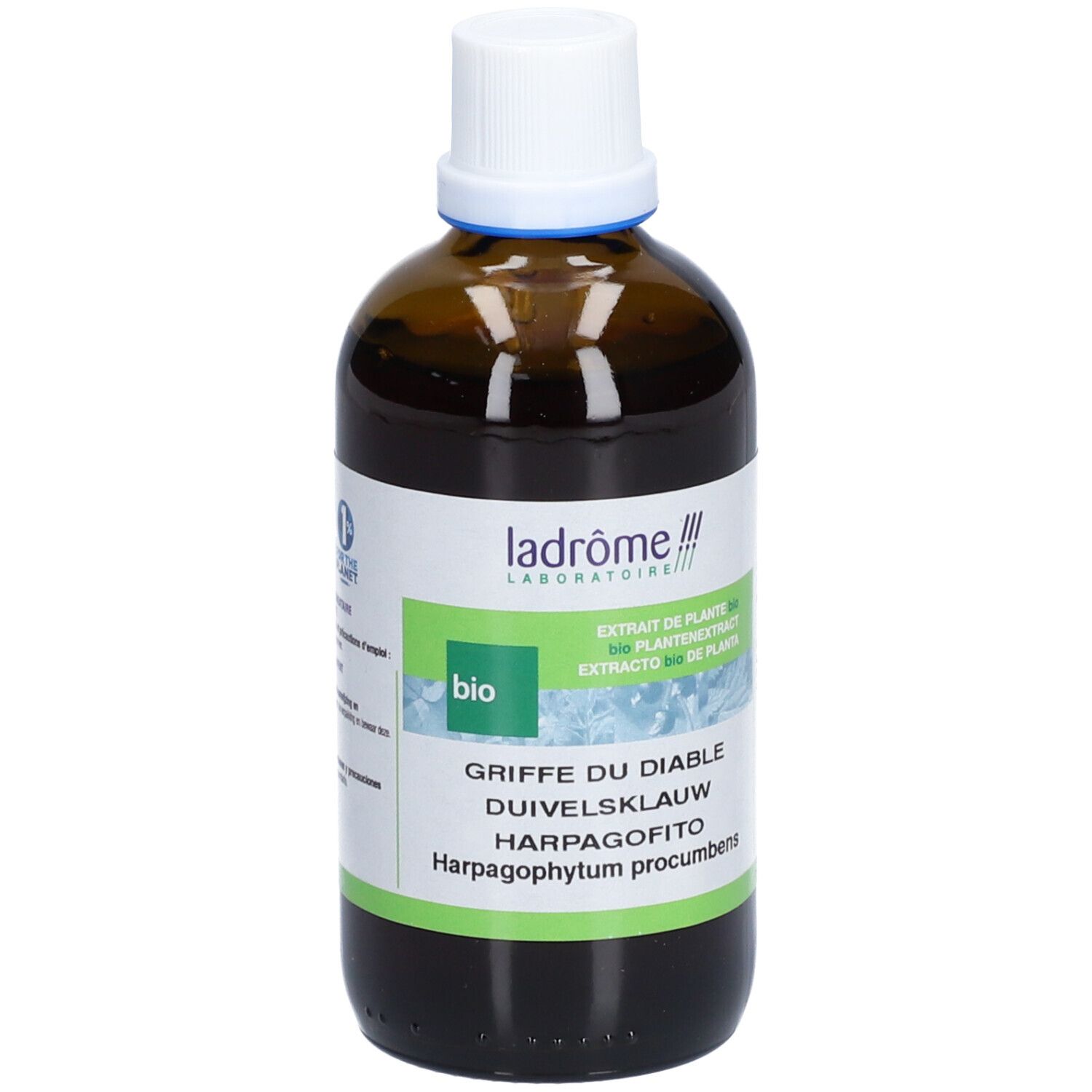 Bruine glazen fles met witte dop. Etiket met productnaam en bio-keurmerk. Tekst in het Frans, Duits, Nederlands en Italiaans.