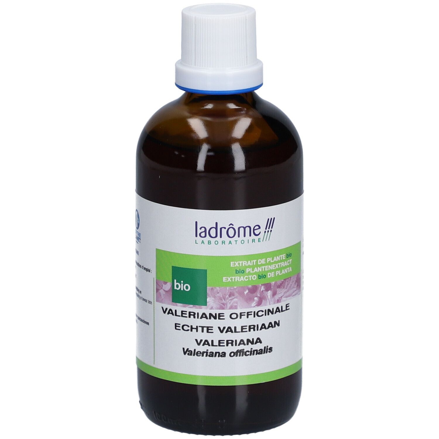 Bruine glazen fles met witte dop. Etiket met groene en witte vlakken, tekst in meerdere talen. Bio-certificering.