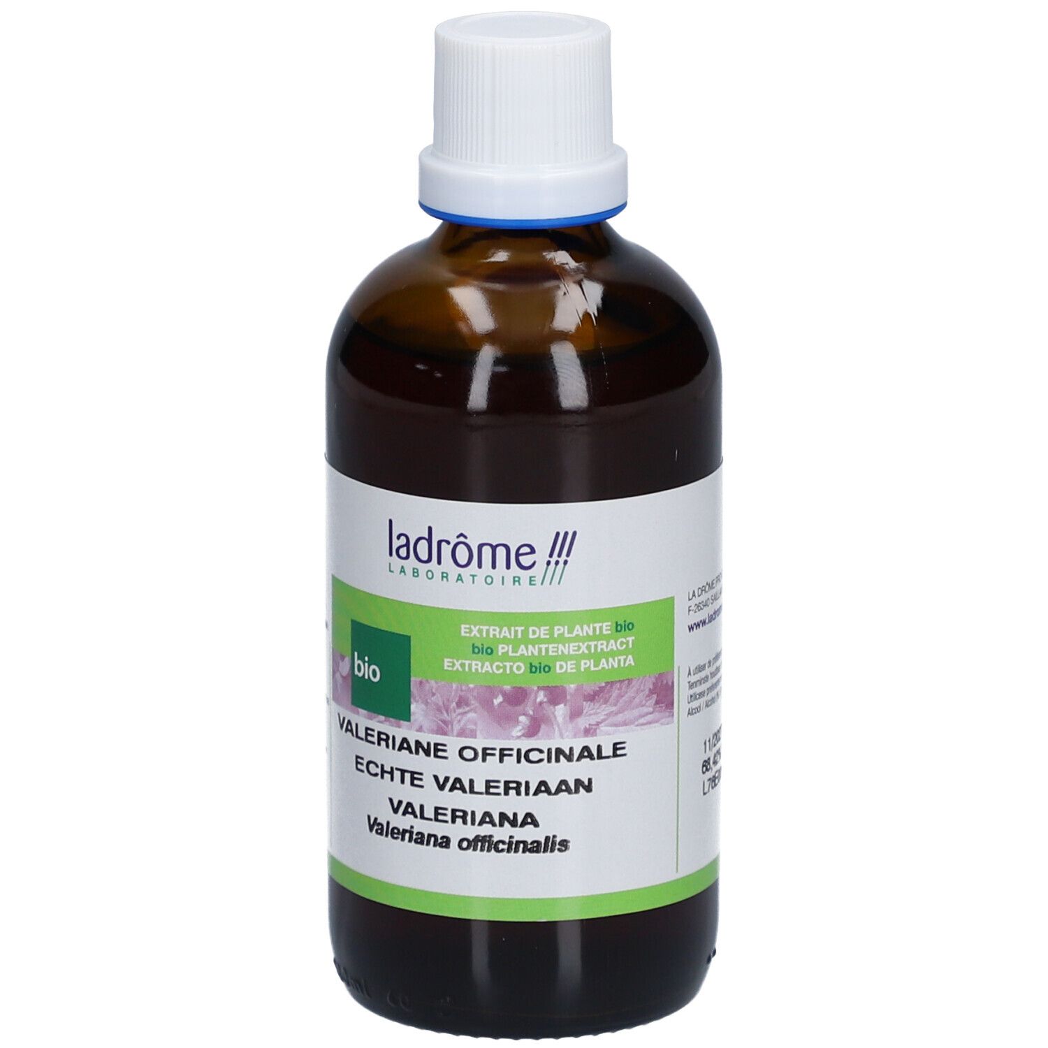 Bruine glazen fles met witte dop. Etiket met tekst in meerdere talen. Bio-certificering.