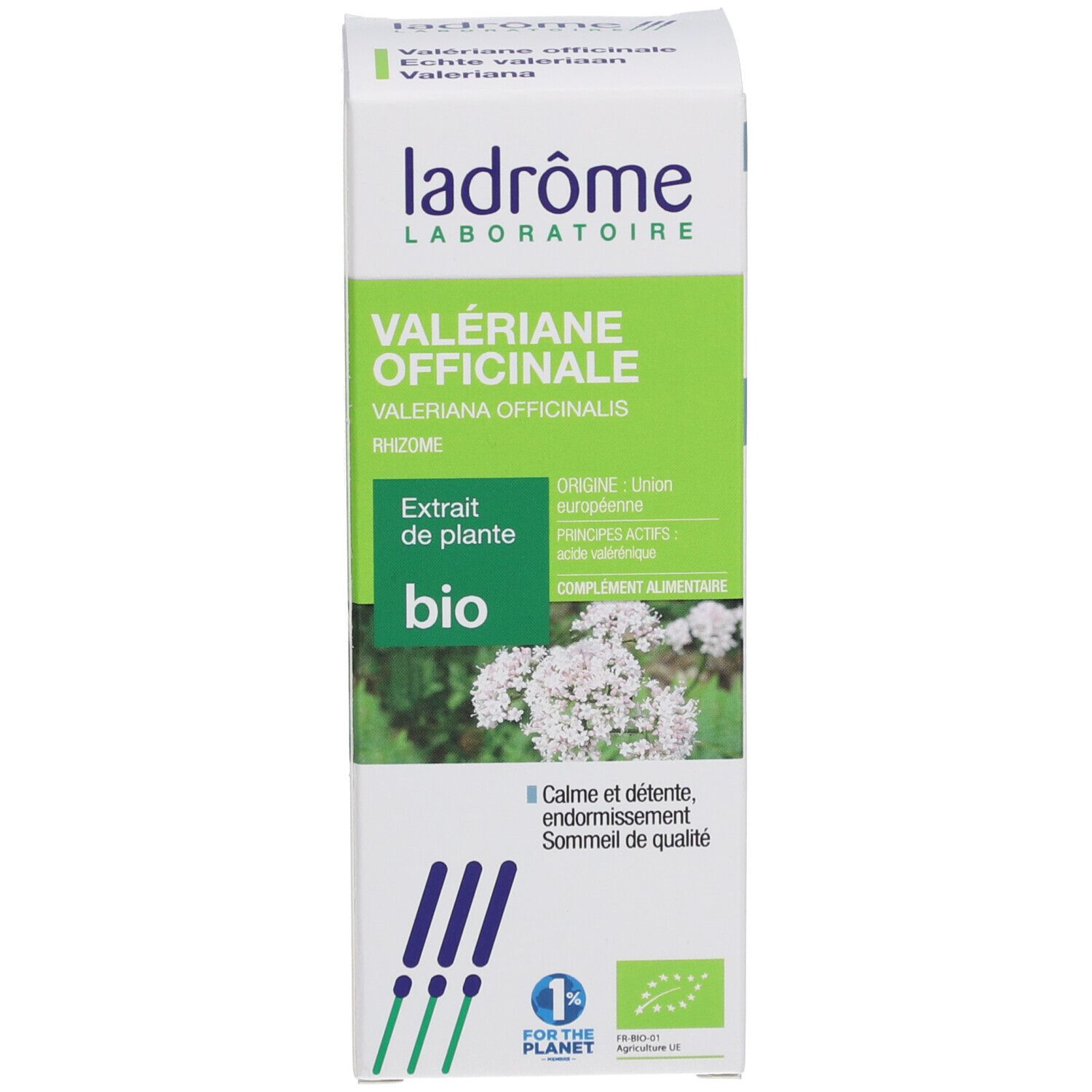 Witte doos met groene accenten. Tekst in meerdere talen, bio-certificering. Afbeelding van een plant.