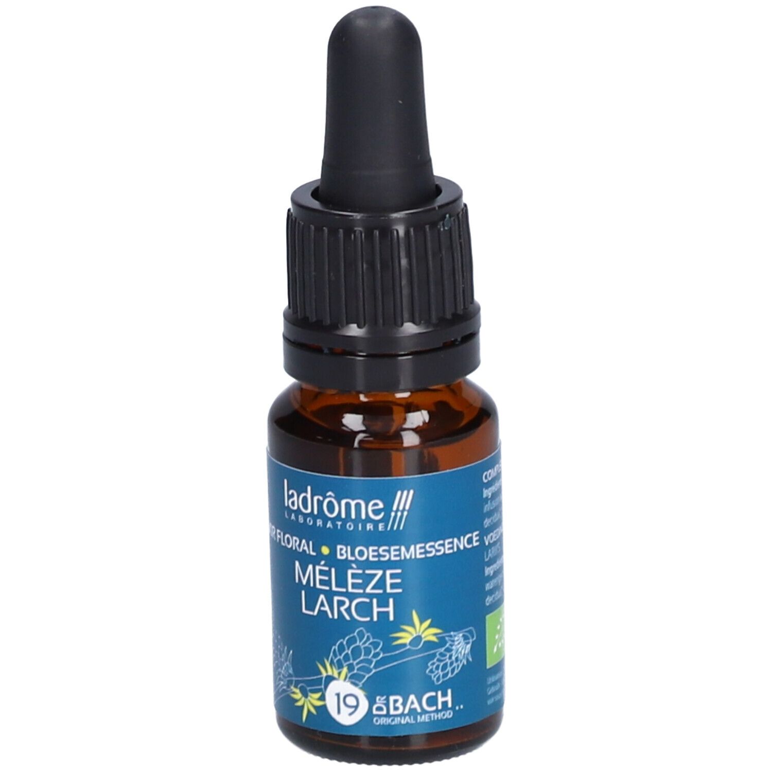 Bruine glazen fles met zwarte dop en pipet. Etiket met tekst: Ladrôme, Mélèze Larch, 19 Bach.