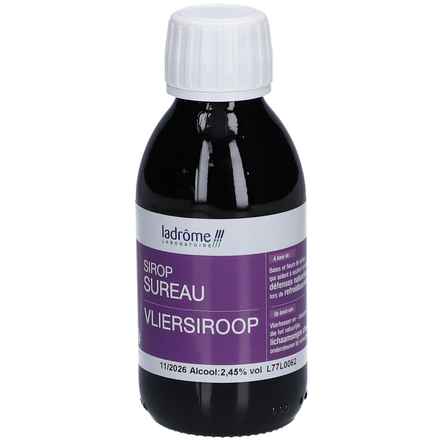 Braune Glasflasche mit weißem Deckel. Etikett mit Produktnamen und Marke. Aufschrift: Sirop Sureau, Vliersiroop.