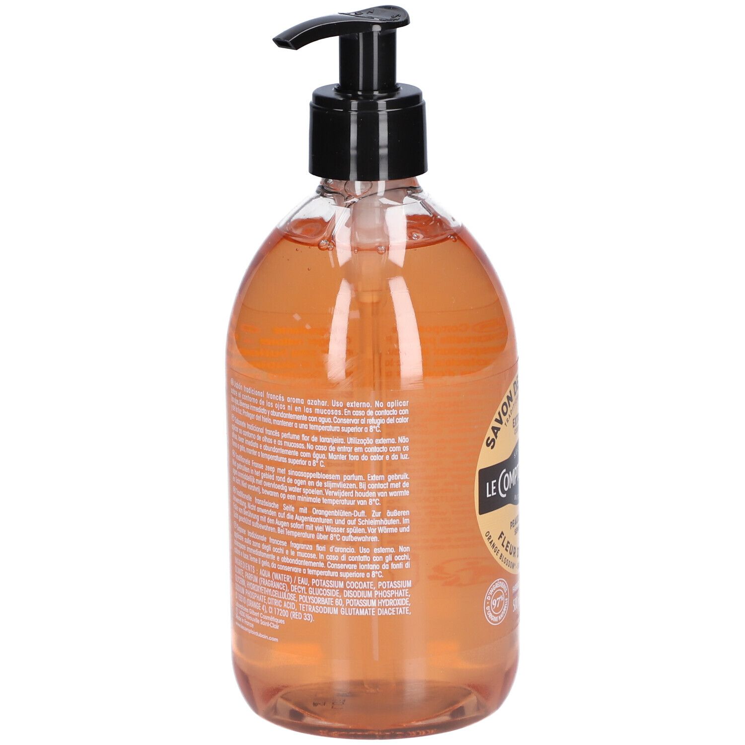 Rückseite der Seifenflasche. Text auf Etikett. Schwarzer Pumpkopf. Transparente Flasche mit orangefarbener Flüssigkeit.