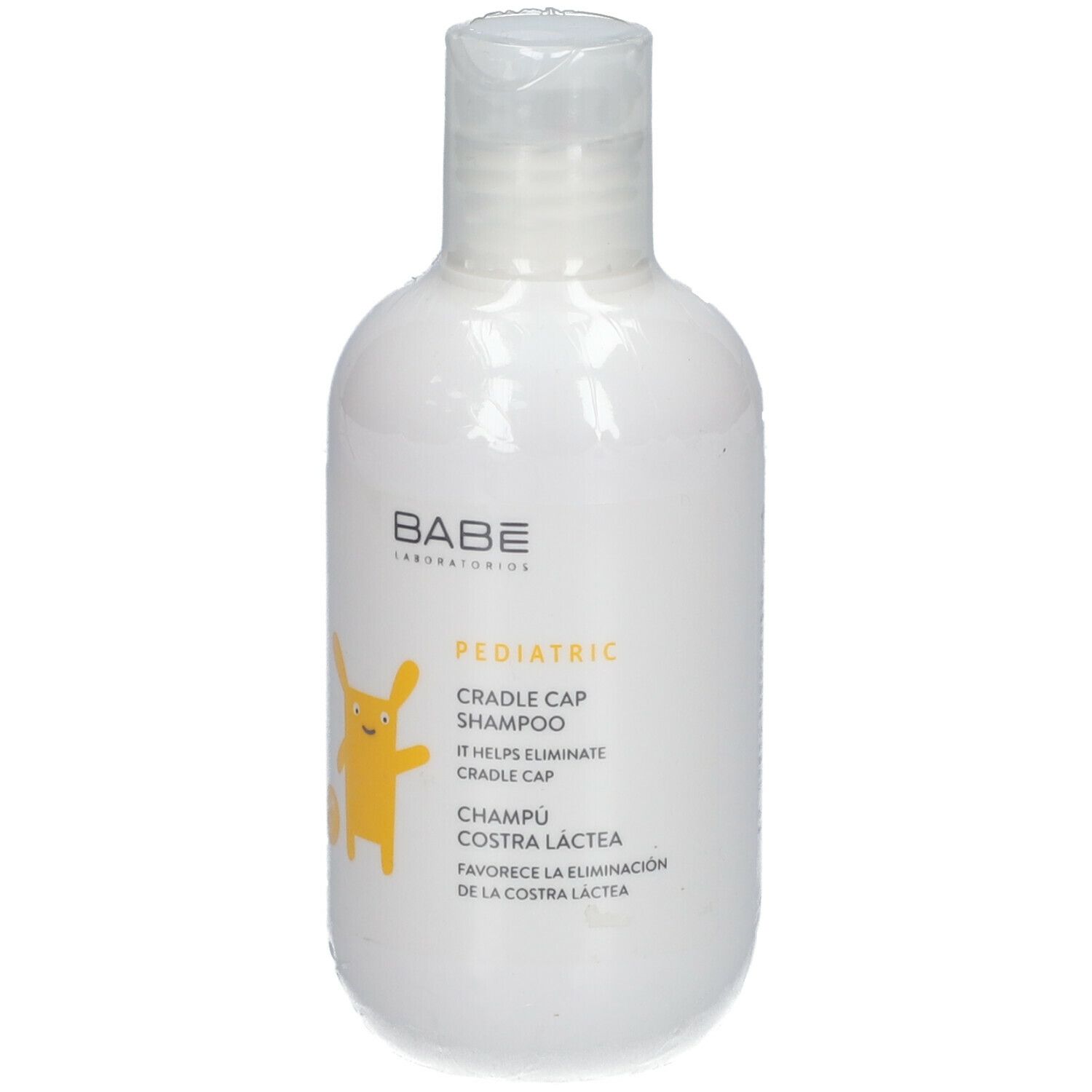 Witte fles Babé Pediatric Cradle Cap Shampoo. Geel konijnlogo. Tekst: « It helps eliminate cradle cap ».